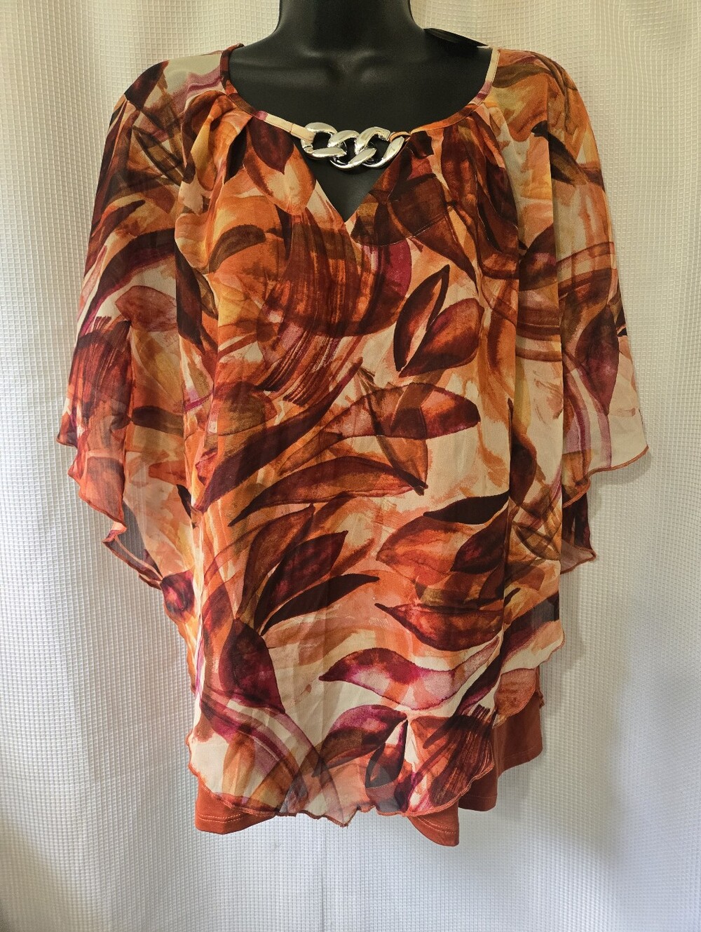 Ava & Grace Orange Multi-Leaf Print Poncho Blouse with Chain Accent